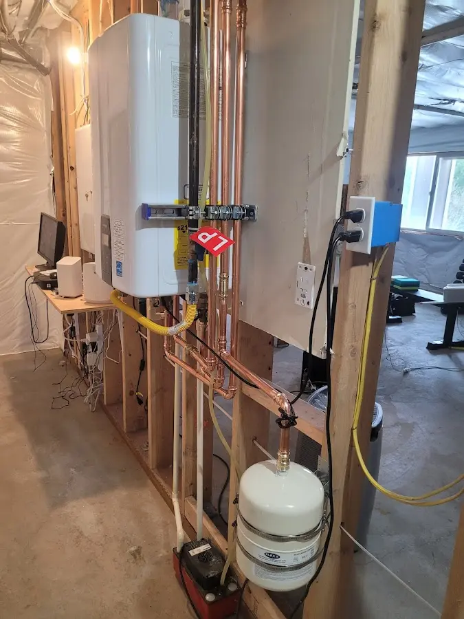 Licensed plumber repairing a kitchen sink in Marina